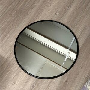 Sleek Black Round Wall Mirror